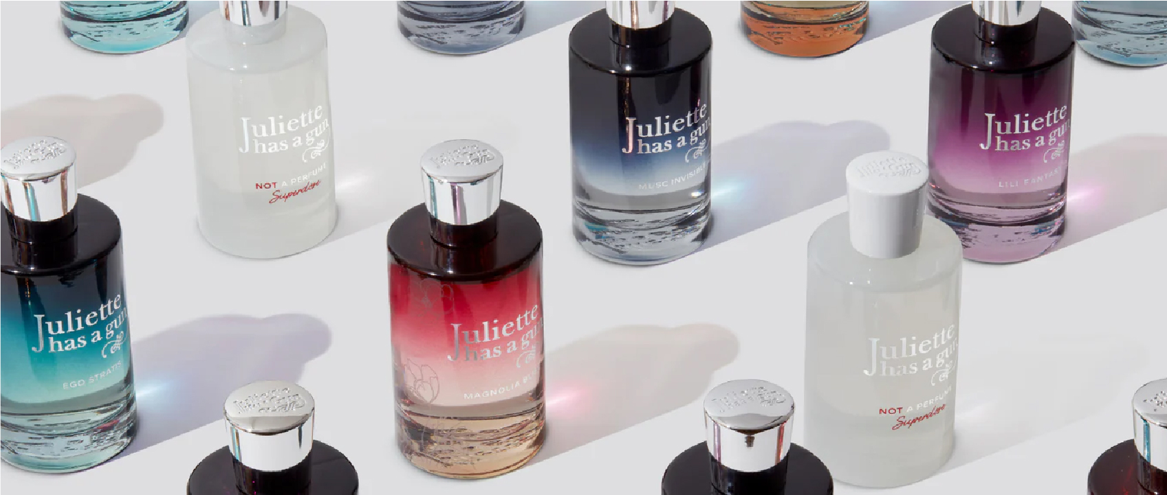 bottles of fragrance from the juliette has a gun collection